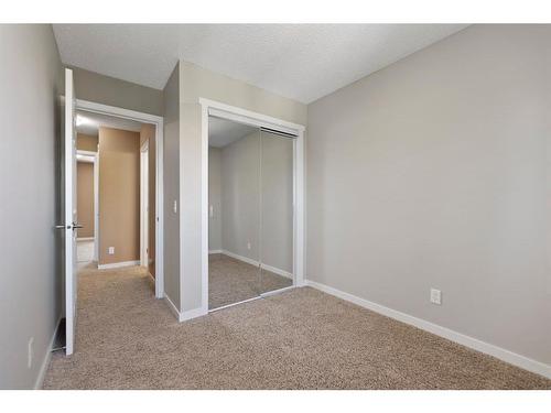 107-9930 Bonaventure Drive Se, Calgary, AB - Indoor Photo Showing Other Room