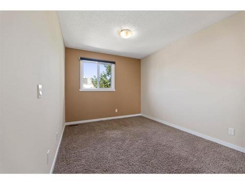 107-9930 Bonaventure Drive Se, Calgary, AB - Indoor Photo Showing Other Room