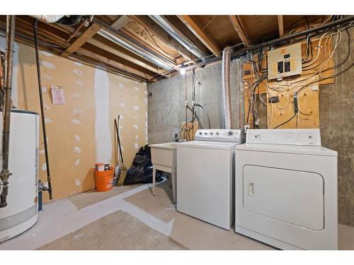 107-9930 Bonaventure Drive Se, Calgary, AB - Indoor Photo Showing Laundry Room