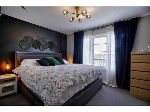 656 Walden Drive Se, Calgary, AB - Indoor Photo Showing Bedroom