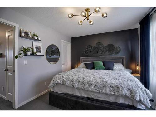 656 Walden Drive Se, Calgary, AB - Indoor Photo Showing Bedroom