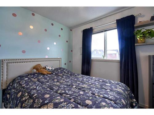 656 Walden Drive Se, Calgary, AB - Indoor Photo Showing Bedroom