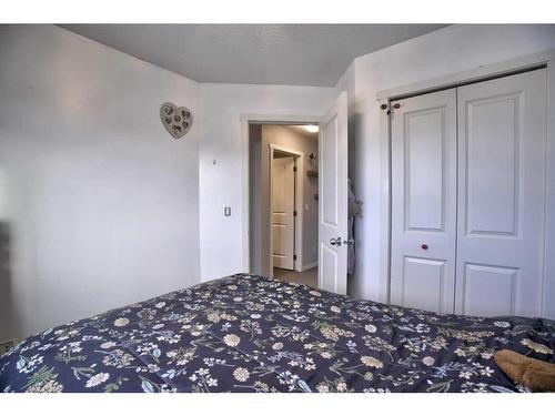 656 Walden Drive Se, Calgary, AB - Indoor Photo Showing Bedroom