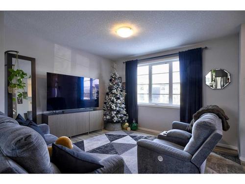 656 Walden Drive Se, Calgary, AB - Indoor Photo Showing Living Room