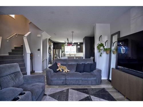 656 Walden Drive Se, Calgary, AB - Indoor Photo Showing Living Room