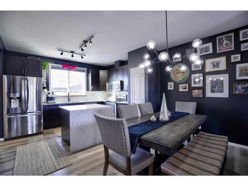 656 Walden Drive Se, Calgary, AB - Indoor Photo Showing Dining Room