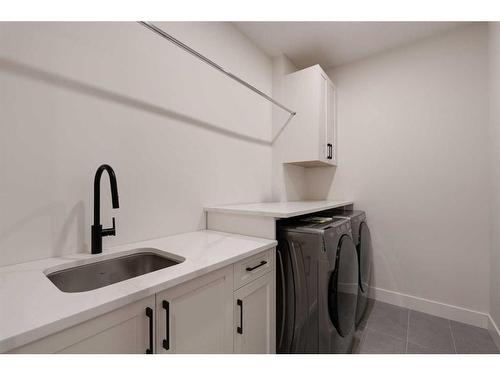 2810 35 Street Sw, Calgary, AB - Indoor Photo Showing Laundry Room