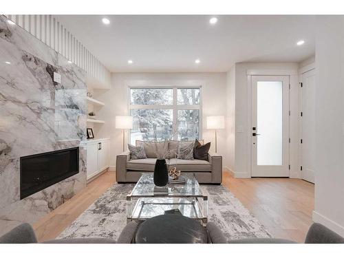 2810 35 Street Sw, Calgary, AB - Indoor Photo Showing Living Room With Fireplace