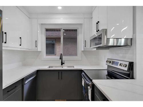 143 Bermuda Drive Nw, Calgary, AB - Indoor Photo Showing Kitchen With Double Sink With Upgraded Kitchen