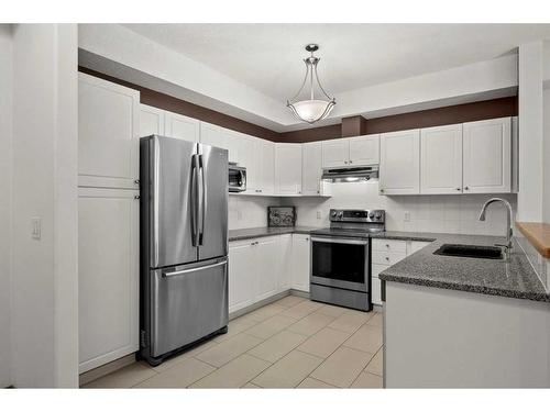 233-223 Tuscany Springs Boulevard Nw, Calgary, AB - Indoor Photo Showing Kitchen With Stainless Steel Kitchen