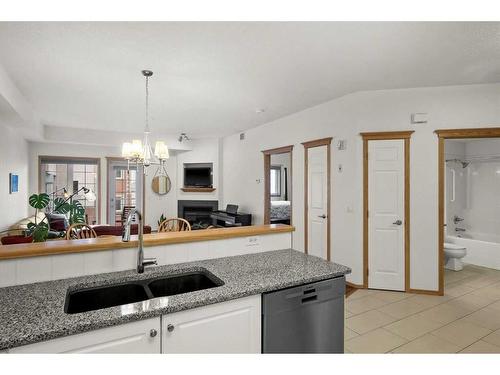 233-223 Tuscany Springs Boulevard Nw, Calgary, AB - Indoor Photo Showing Kitchen With Double Sink