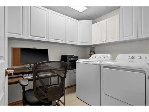 233-223 Tuscany Springs Boulevard Nw, Calgary, AB - Indoor Photo Showing Laundry Room