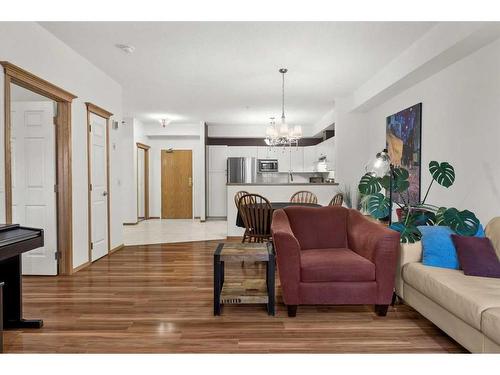 233-223 Tuscany Springs Boulevard Nw, Calgary, AB - Indoor Photo Showing Living Room