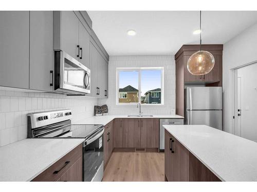 43 Sage Hill Lane Nw, Calgary, AB - Indoor Photo Showing Kitchen With Stainless Steel Kitchen With Upgraded Kitchen