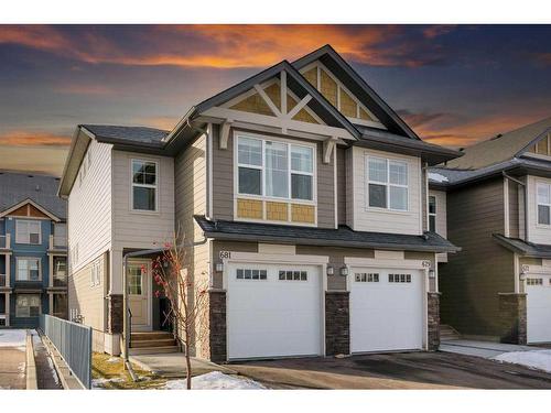 681-101 Sunset Drive, Cochrane, AB - Outdoor With Facade