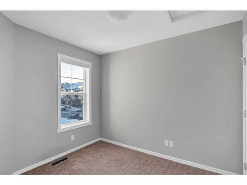 681-101 Sunset Drive, Cochrane, AB - Indoor Photo Showing Other Room