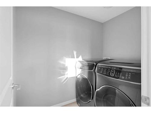 681-101 Sunset Drive, Cochrane, AB - Indoor Photo Showing Laundry Room