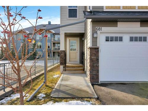 681-101 Sunset Drive, Cochrane, AB - Outdoor With Facade