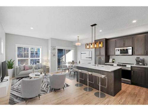 681-101 Sunset Drive, Cochrane, AB - Indoor Photo Showing Kitchen With Stainless Steel Kitchen With Upgraded Kitchen