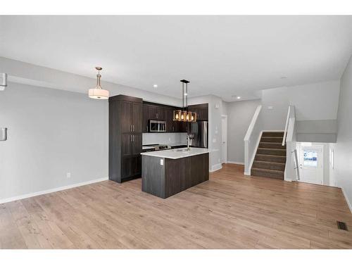 681-101 Sunset Drive, Cochrane, AB - Indoor Photo Showing Kitchen