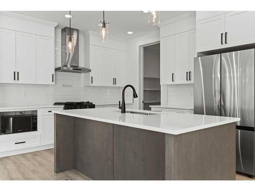 15 Sandpiper Bend, Chestermere, AB - Indoor Photo Showing Kitchen With Upgraded Kitchen