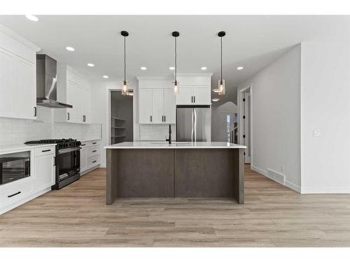 15 Sandpiper Bend, Chestermere, AB - Indoor Photo Showing Kitchen With Upgraded Kitchen