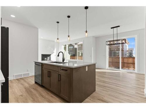 15 Sandpiper Bend, Chestermere, AB - Indoor Photo Showing Kitchen With Double Sink With Upgraded Kitchen