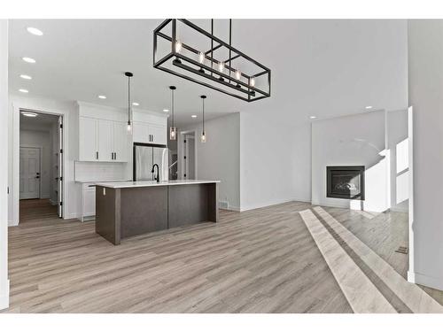 15 Sandpiper Bend, Chestermere, AB - Indoor Photo Showing Kitchen With Upgraded Kitchen