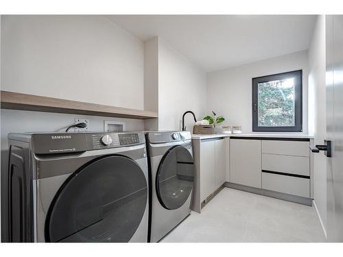 103 Lissington Drive Sw, Calgary, AB - Indoor Photo Showing Laundry Room