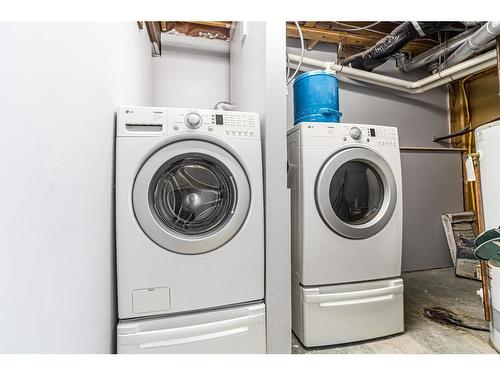 143 Erin Meadow Green Se, Calgary, AB - Indoor Photo Showing Laundry Room