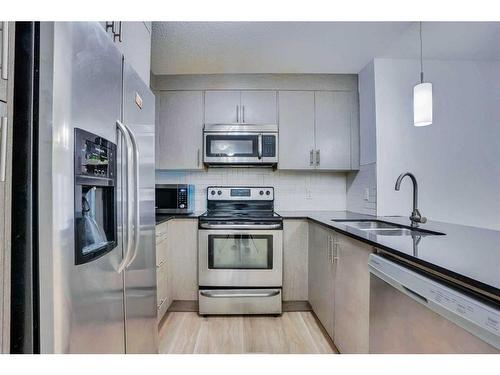 3304-240 Skyview Ranch Road Ne, Calgary, AB - Indoor Photo Showing Kitchen With Stainless Steel Kitchen With Double Sink With Upgraded Kitchen