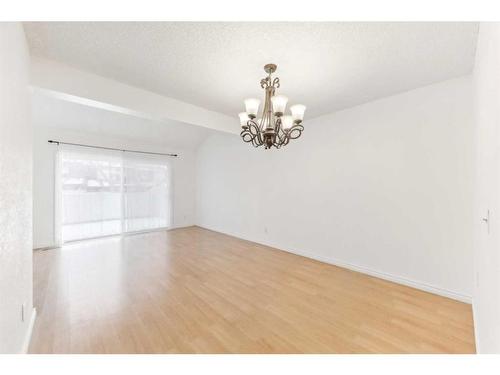 501-2520 Palliser Drive Sw, Calgary, AB - Indoor Photo Showing Other Room