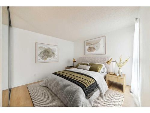 501-2520 Palliser Drive Sw, Calgary, AB - Indoor Photo Showing Bedroom