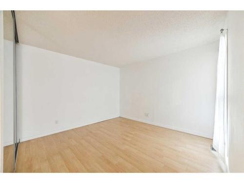 501-2520 Palliser Drive Sw, Calgary, AB - Indoor Photo Showing Other Room