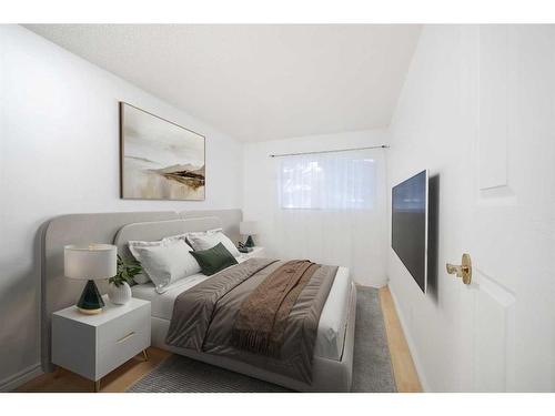 501-2520 Palliser Drive Sw, Calgary, AB - Indoor Photo Showing Bedroom