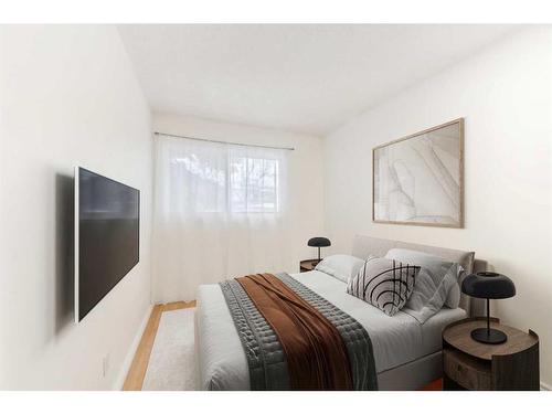 501-2520 Palliser Drive Sw, Calgary, AB - Indoor Photo Showing Bedroom