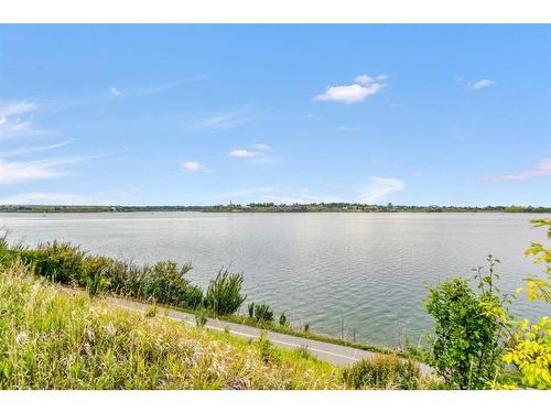 501-2520 Palliser Drive Sw, Calgary, AB - Outdoor With Body Of Water With View