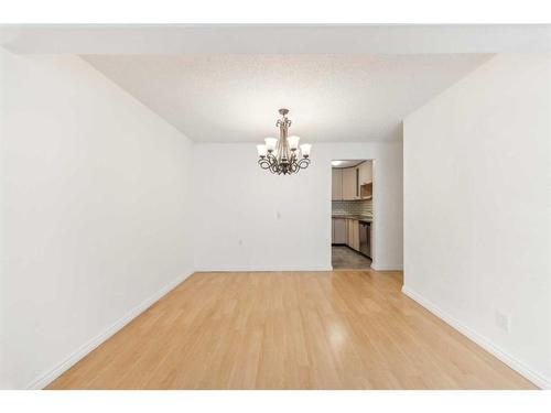 501-2520 Palliser Drive Sw, Calgary, AB - Indoor Photo Showing Other Room