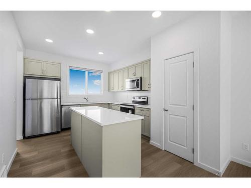 180 Belmont Way, Calgary, AB - Indoor Photo Showing Kitchen With Stainless Steel Kitchen