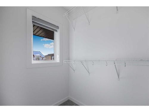 180 Belmont Way, Calgary, AB - Indoor With Storage