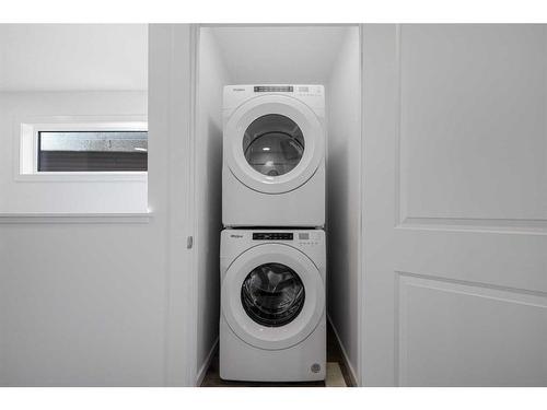 180 Belmont Way, Calgary, AB - Indoor Photo Showing Laundry Room