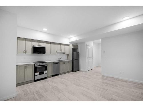 180 Belmont Way, Calgary, AB - Indoor Photo Showing Kitchen With Stainless Steel Kitchen