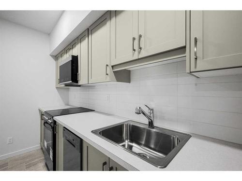 180 Belmont Way, Calgary, AB - Indoor Photo Showing Kitchen