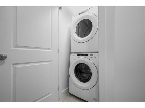 180 Belmont Way, Calgary, AB - Indoor Photo Showing Laundry Room