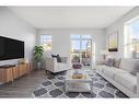 47 Sherwood Row Nw, Calgary, AB  - Indoor Photo Showing Living Room 