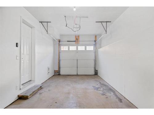 47 Sherwood Row Nw, Calgary, AB - Indoor Photo Showing Garage