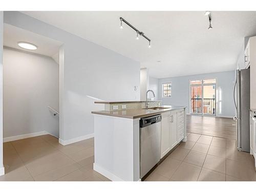 47 Sherwood Row Nw, Calgary, AB - Indoor Photo Showing Kitchen With Stainless Steel Kitchen