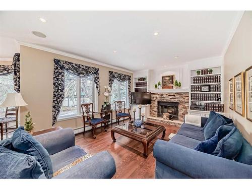 12 Edenstone Way Nw, Calgary, AB - Indoor Photo Showing Living Room With Fireplace