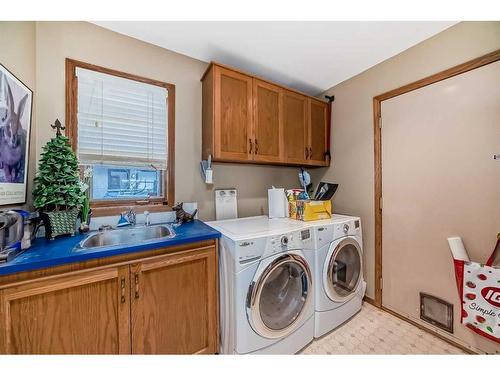 12 Edenstone Way Nw, Calgary, AB - Indoor Photo Showing Laundry Room