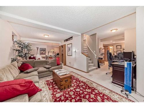 12 Edenstone Way Nw, Calgary, AB - Indoor Photo Showing Living Room